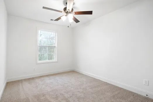 940 Britton Springs Road, Unit 604 Clarksville, TN 37042 - Photo 26 of 30 an empty room with a window and a fan