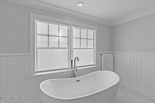 a bathroom with a shower and toilet