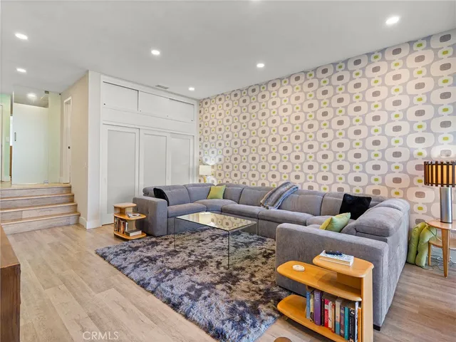 a view of a balcony with wooden floor