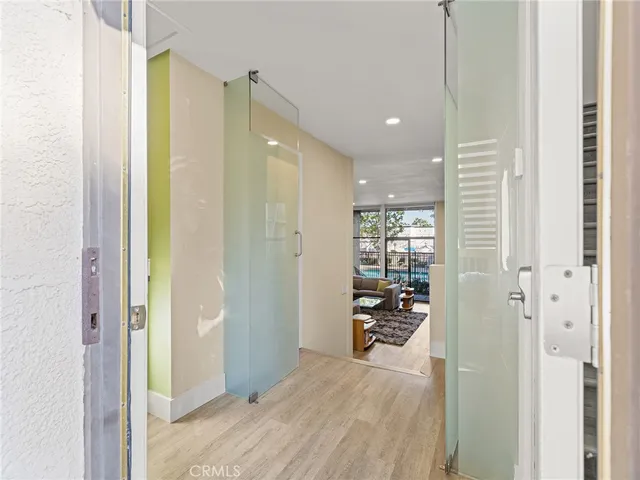 a bathroom with a sink and shower