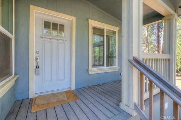 a view of front door with wooden floor