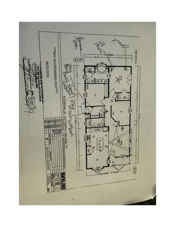 a view of a house with backyard