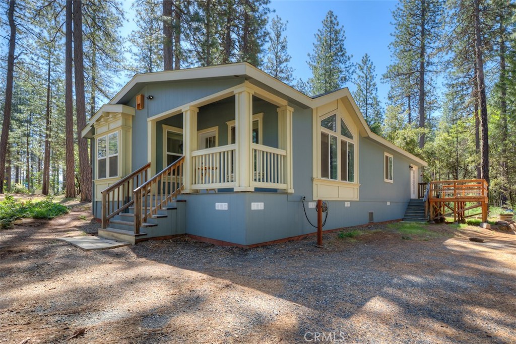 14565 Coutolenc Road Magalia, CA 95954 - Photo 9 of 43 a view of a house with a yard and wooden fence