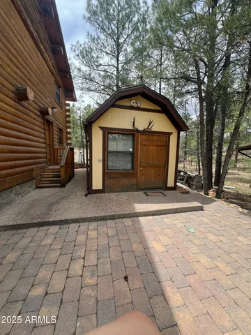a view of entrance gate of a house