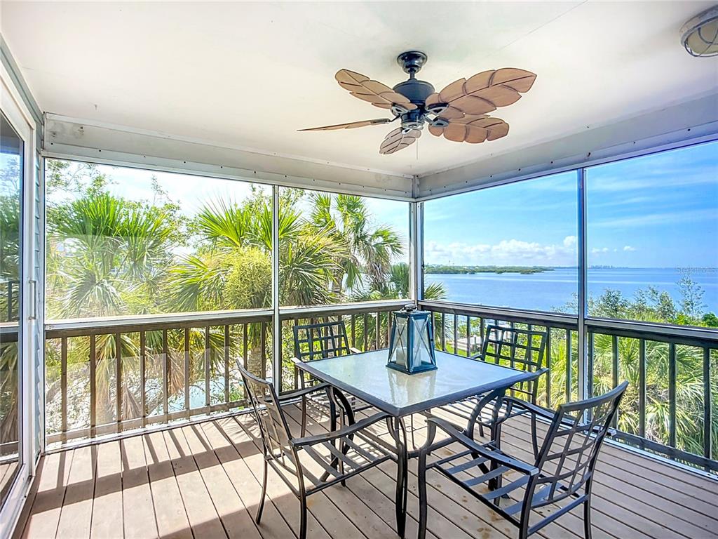 2424 69th Avenue West, Unit 2424 Bradenton, FL 34207 - Photo 16 of 49 a view of a dining room with furniture window and outside view