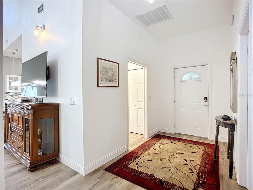 2424 69th Avenue West, Unit 2424 Bradenton, FL 34207 - Photo 20 of 49 a view of a hallway with interior of the house