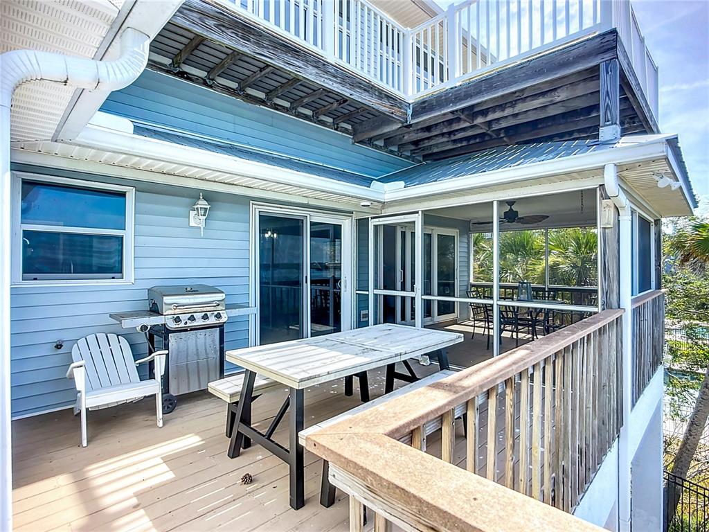 2424 69th Avenue West, Unit 2424 Bradenton, FL 34207 - Photo 34 of 49 a view of porch with seating space