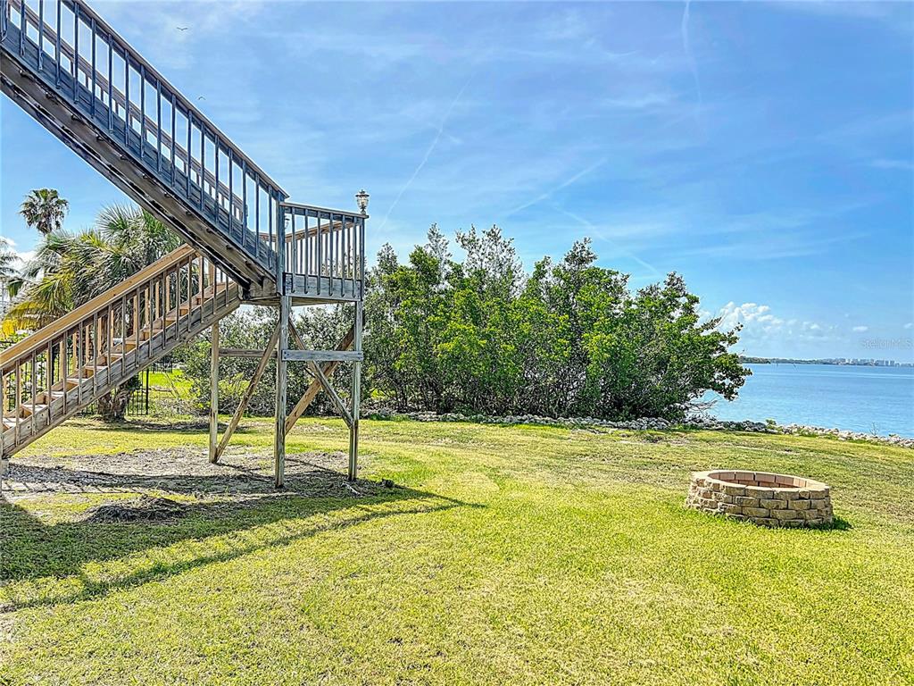 2424 69th Avenue West, Unit 2424 Bradenton, FL 34207 - Photo 44 of 49 a view of a swimming pool with an ocean view