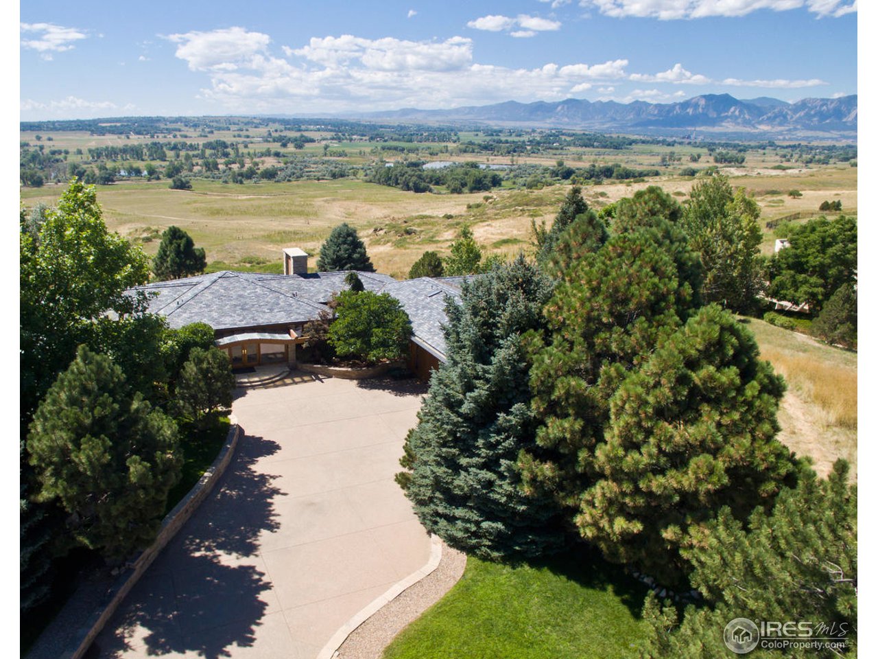 8818 West Phillips Road Boulder, CO 80301 - Photo 24 of 25 a view of a lake with a mountain in the background