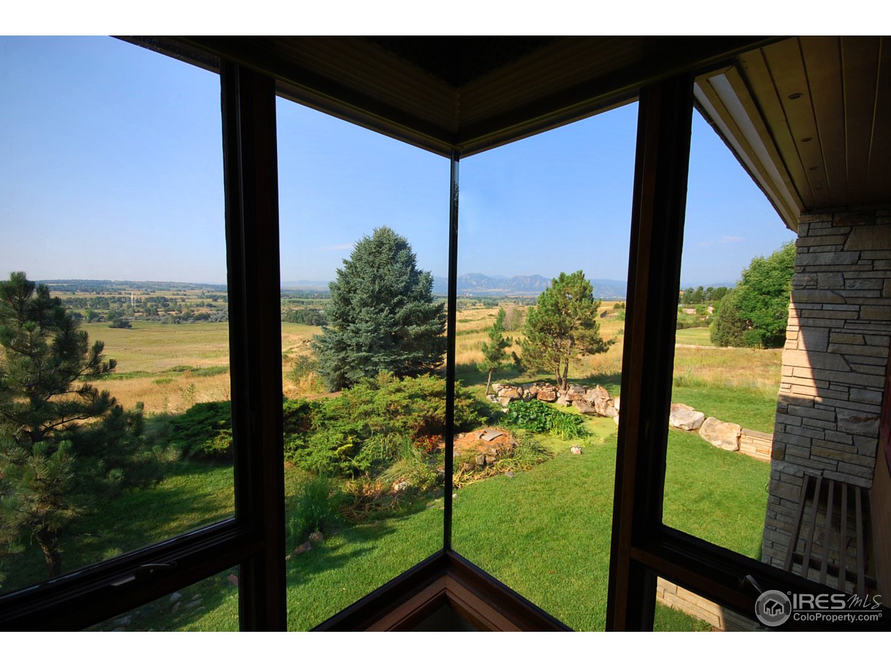 8818 West Phillips Road Boulder, CO 80301 - Photo 6 of 25 a view of lake from window