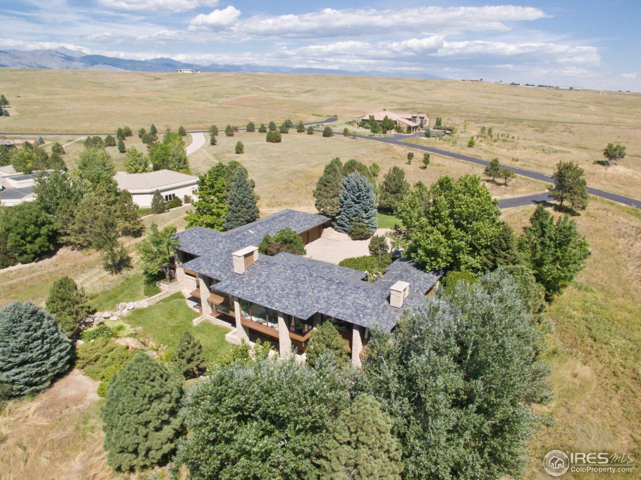 8818 West Phillips Road Boulder, CO 80301 - Photo 9 of 25 a aerial view of a house with a lake view