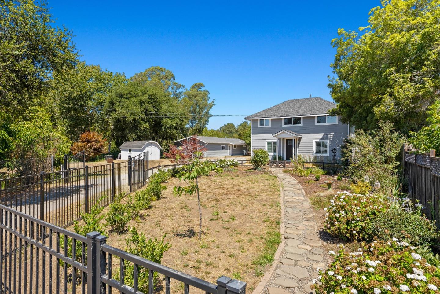 129 Browns Valley Road, Unit A Watsonville, CA 95076 - Photo 1 of 45 a view of a house with wooden fence
