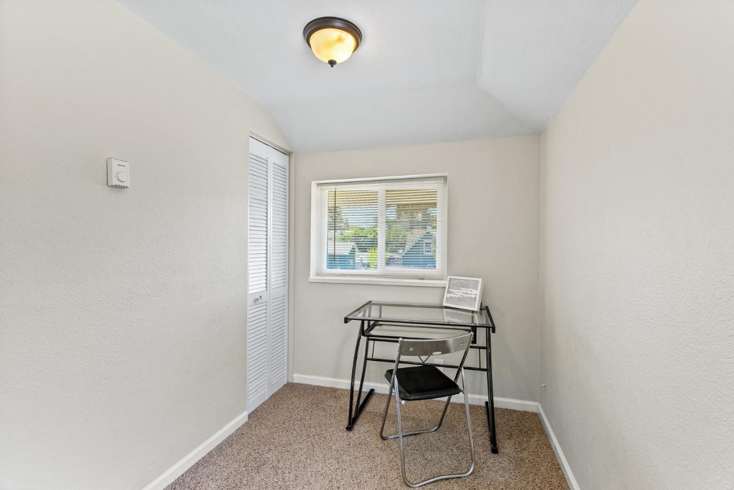 129 Browns Valley Road, Unit A Watsonville, CA 95076 - Photo 12 of 45 a workspace with a window