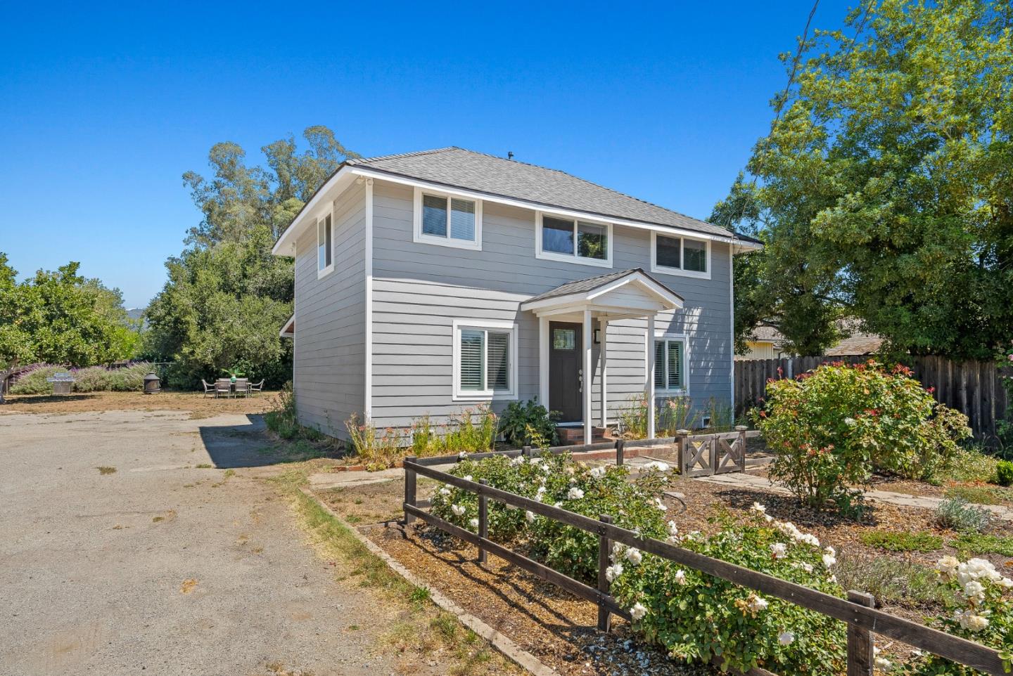 129 Browns Valley Road, Unit A Watsonville, CA 95076 - Photo 3 of 45 a front view of a house with a yard
