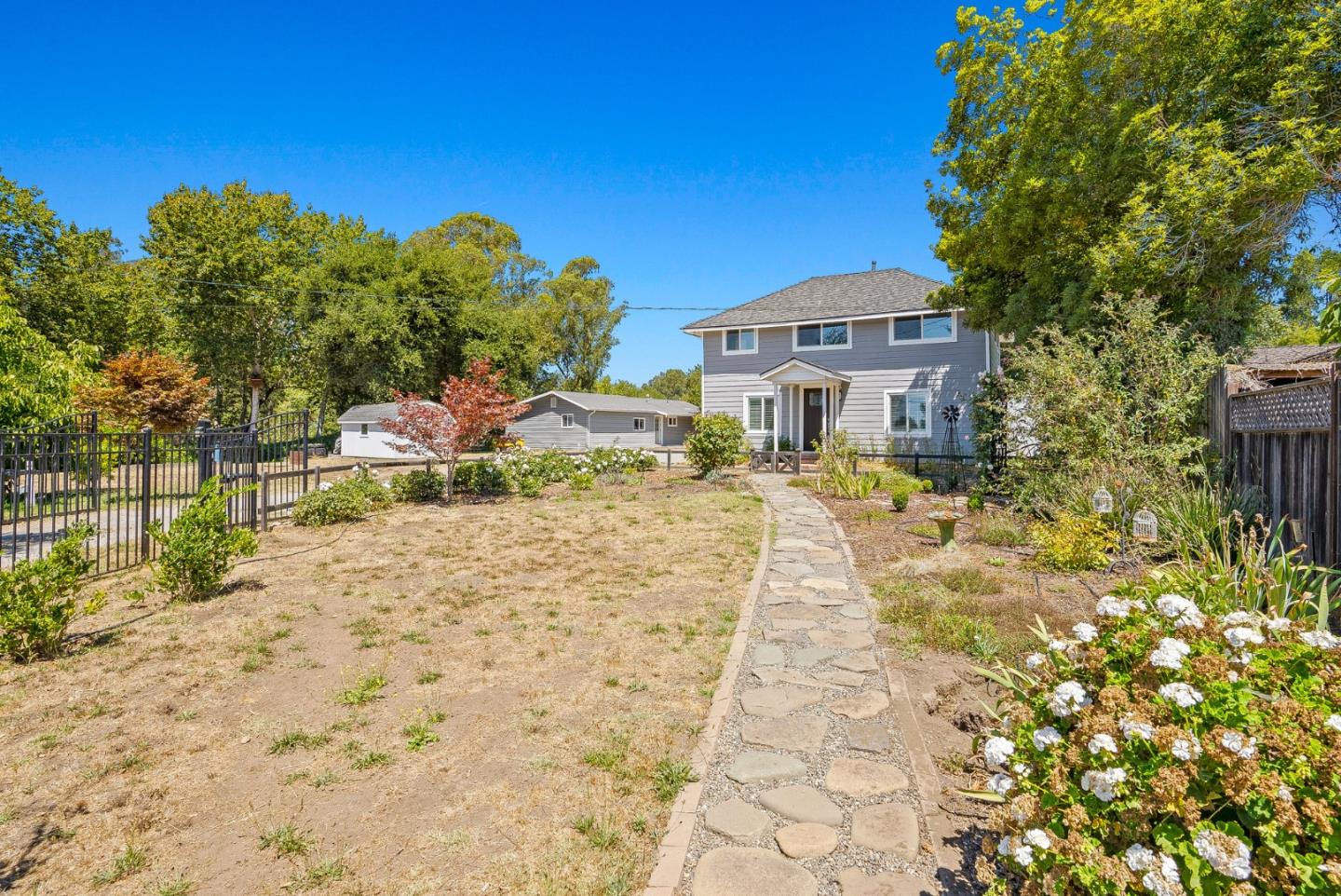 129 Browns Valley Road, Unit A Watsonville, CA 95076 - Photo 39 of 45 a view of a house with a yard