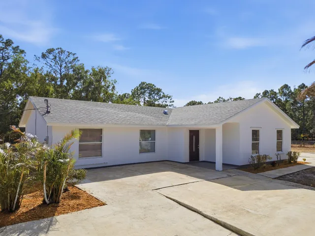 $595,000 | 14242 77th Place North, The Acreage, FL 33470