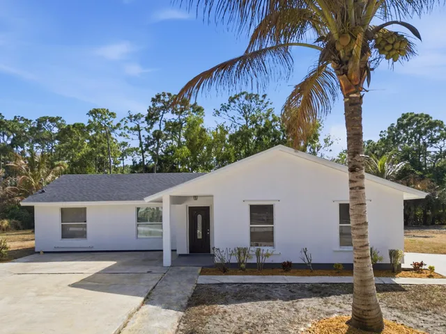 $595,000 | 14242 77th Place North, The Acreage, FL 33470