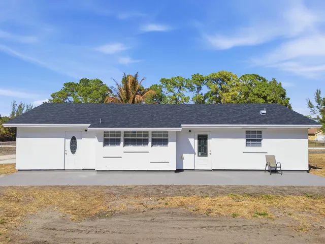 $595,000 | 14242 77th Place North, The Acreage, FL 33470