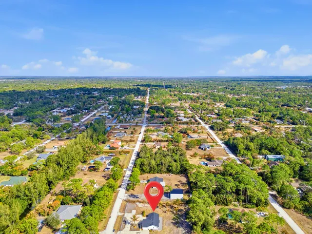 $595,000 | 14242 77th Place North, The Acreage, FL 33470