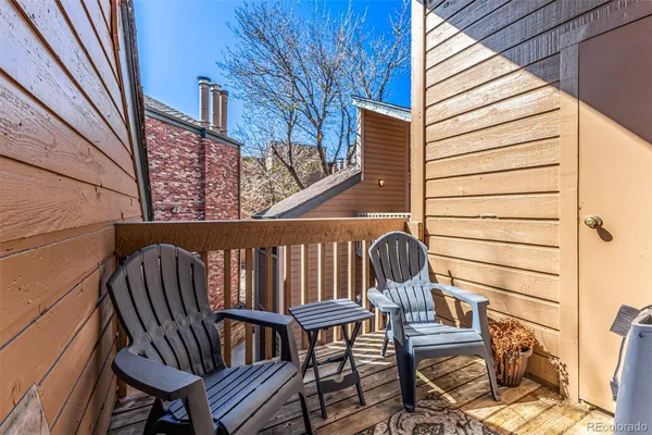a view of a chairs and tables in the patio