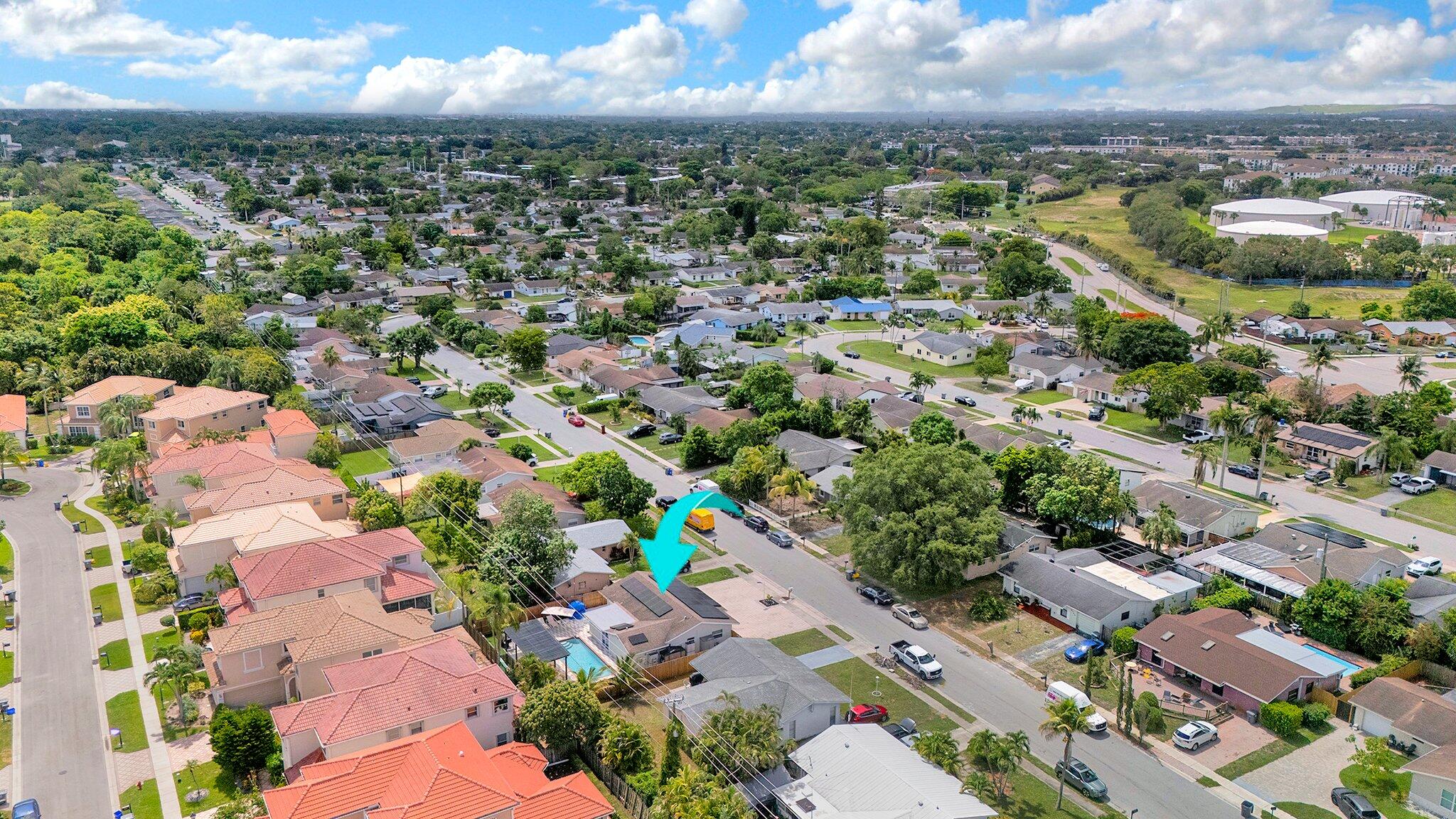 9709 Southwest 1st Place Boca Raton, FL 33428 - Photo 32 of 32 an aerial view of residential houses with outdoor space