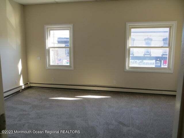 15 West Front Street Keyport, NJ 07735 - Photo 3 of 7 an empty room with windows