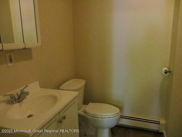 15 West Front Street Keyport, NJ 07735 - Photo 5 of 7 a bathroom with a sink and a toilet
