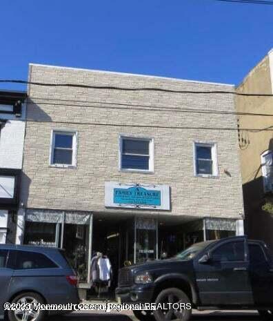 15 West Front Street Keyport, NJ 07735 - Photo 7 of 7 a front view of a building with glass windows
