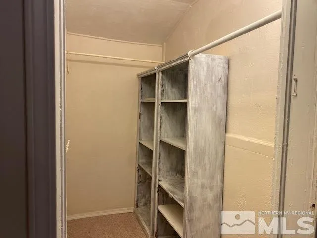 a bathroom with a sink mirror and a bathtub