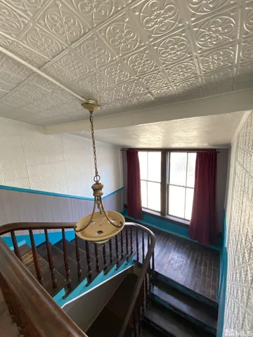 a view of entryway wih livingroom and furniture