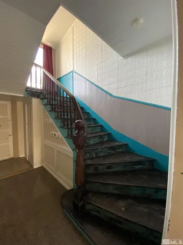 a view of entryway wih livingroom and furniture