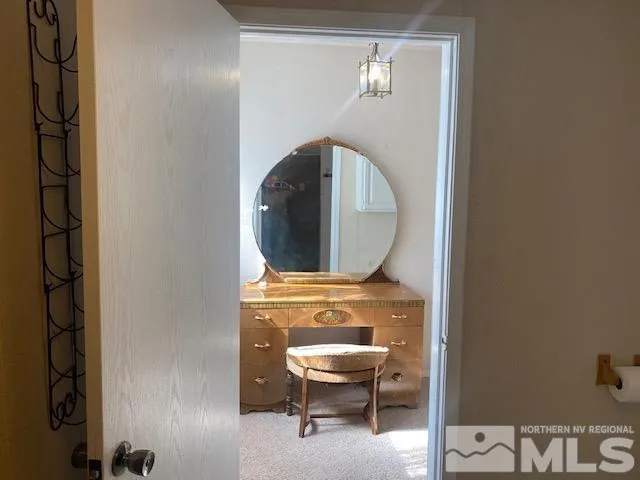 a bathroom with a shower and a mirror