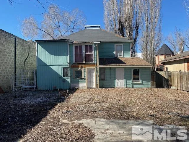 a view of a trees in a backyard