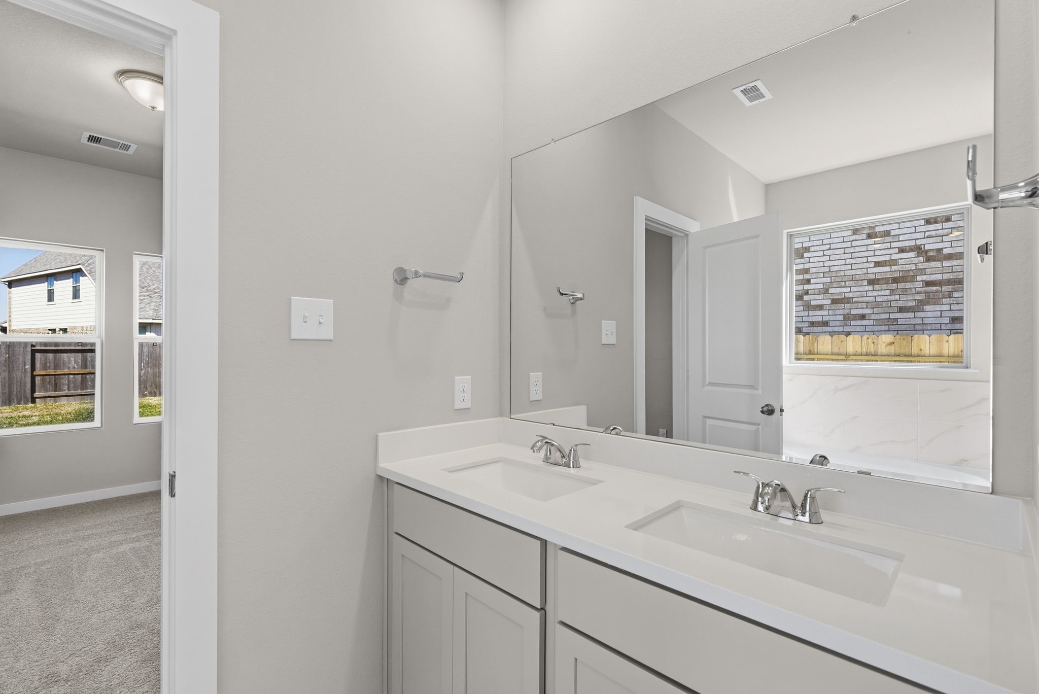 3627 Atlas Pt Lane Angleton, TX 77515 - Photo 17 of 36 a bathroom with a sink and a mirror