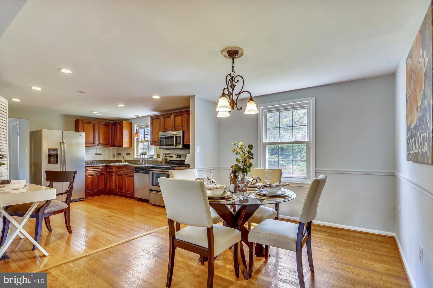 15428 Wembrough Street Silver Spring, MD 20905 - Photo 36 of 36 Dining Room to Kitchen Open Floor Plan