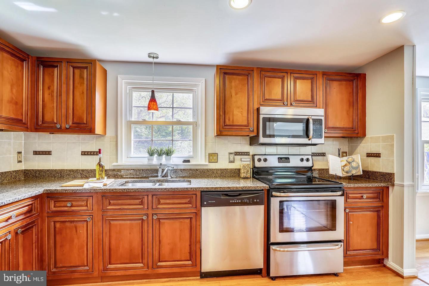 15428 Wembrough Street Silver Spring, MD 20905 - Photo 14 of 36 Updated Kitchen with outdoor view