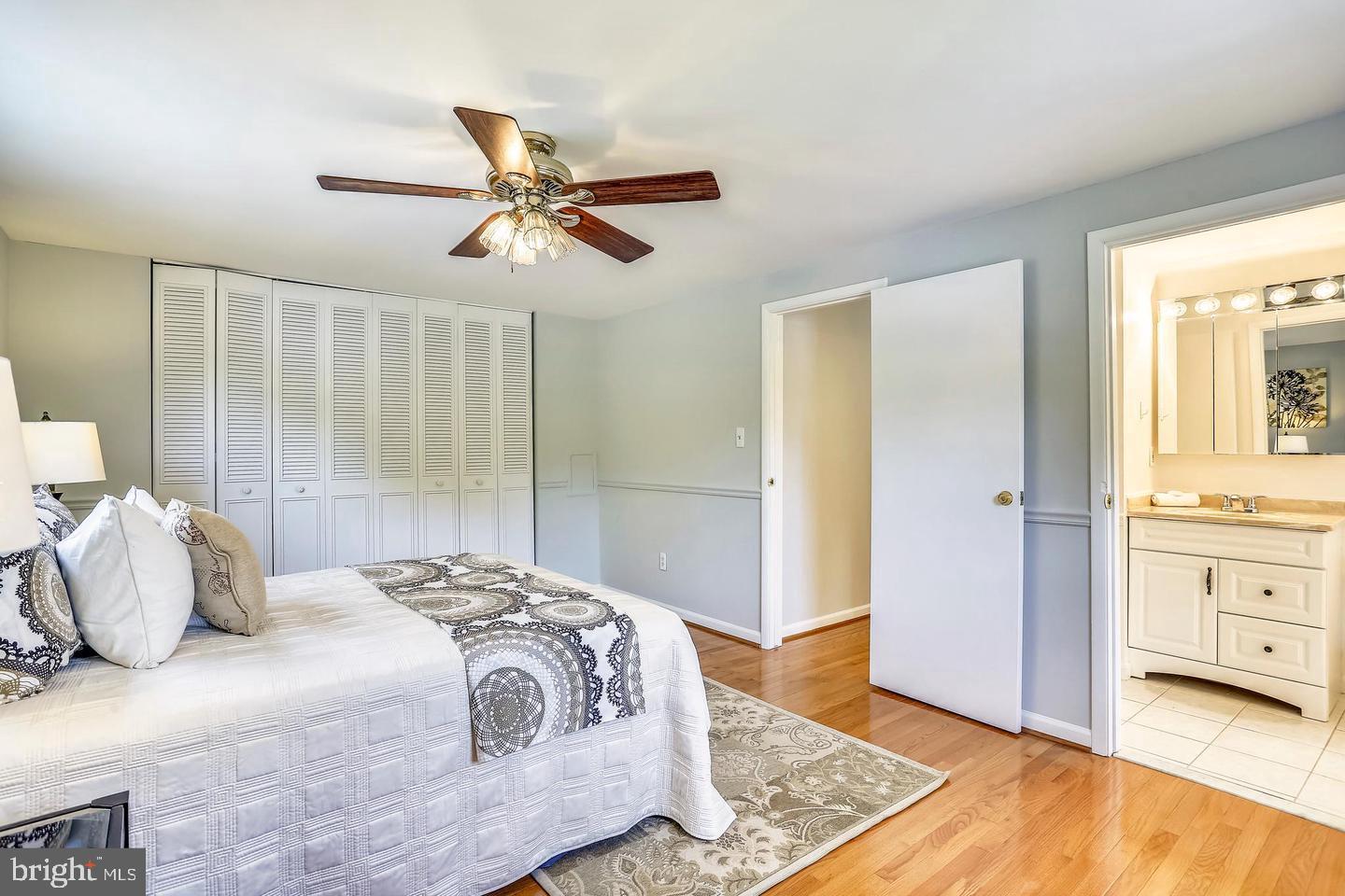 15428 Wembrough Street Silver Spring, MD 20905 - Photo 18 of 36 Master Bedroom w/double closet and bathroom view