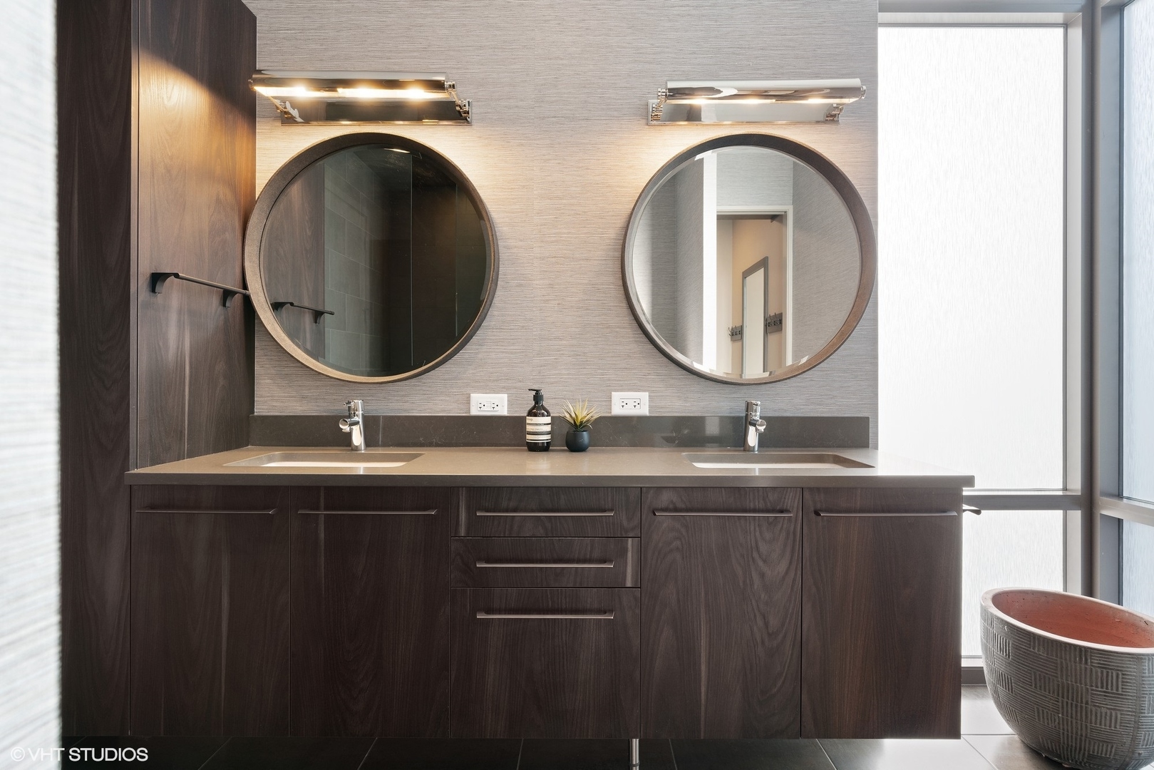 40 North Carpenter Street, Unit PHN Chicago, IL 60607 - Photo 19 of 33 a bathroom with a sink and a mirror