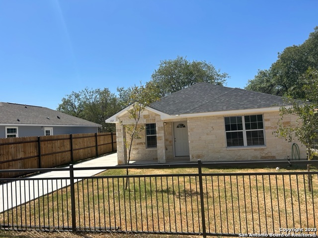 132 Esma Street San Antonio, TX 78223 - Photo 1 of 1 a view of a house with a balcony