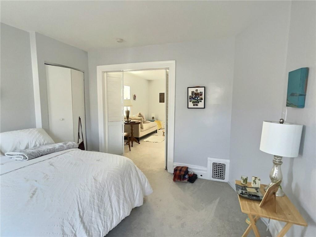 724 Washington Street, Unit 2 Sewickley, PA 15143 - Photo 11 of 18 a bedroom with a bed and furniture