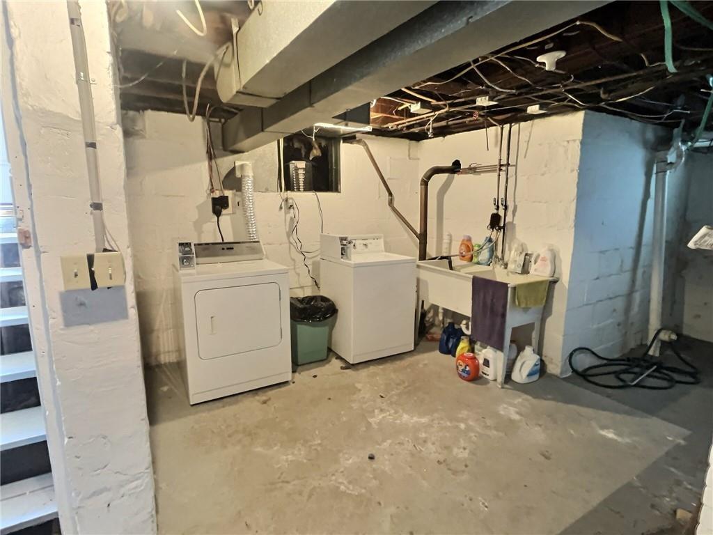 724 Washington Street, Unit 2 Sewickley, PA 15143 - Photo 17 of 18 a view of a storage & utility room with washer and dryer