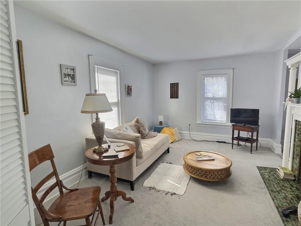 724 Washington Street, Unit 2 Sewickley, PA 15143 - Photo 2 of 18 a living room with furniture and a table