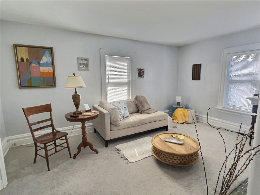 724 Washington Street, Unit 2 Sewickley, PA 15143 - Photo 4 of 18 a living room with furniture and a wooden floor