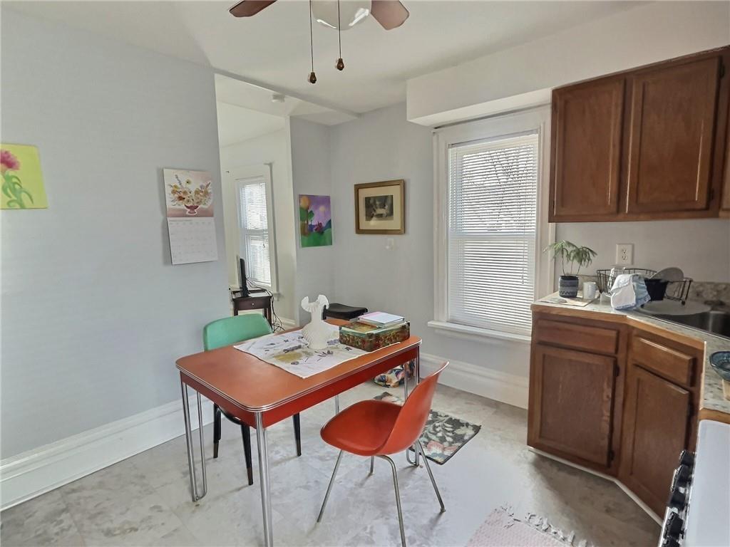 724 Washington Street, Unit 2 Sewickley, PA 15143 - Photo 8 of 18 a room with granite countertop furniture a rug and a window