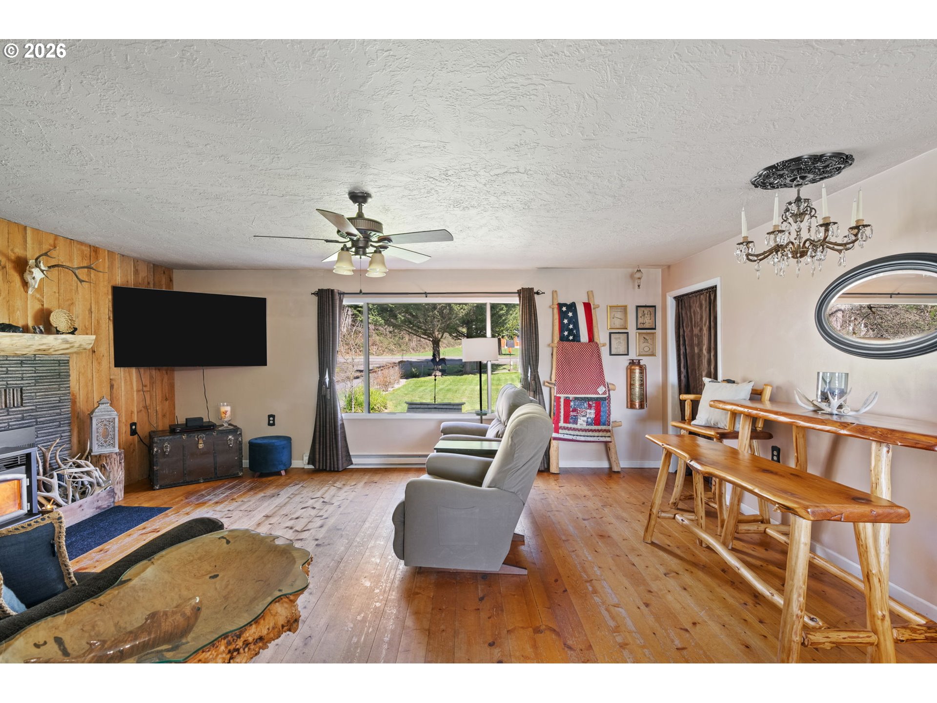 15052 Lewis River Road Ariel, WA 98603 - Photo 11 of 40 a living room with furniture and a flat screen tv