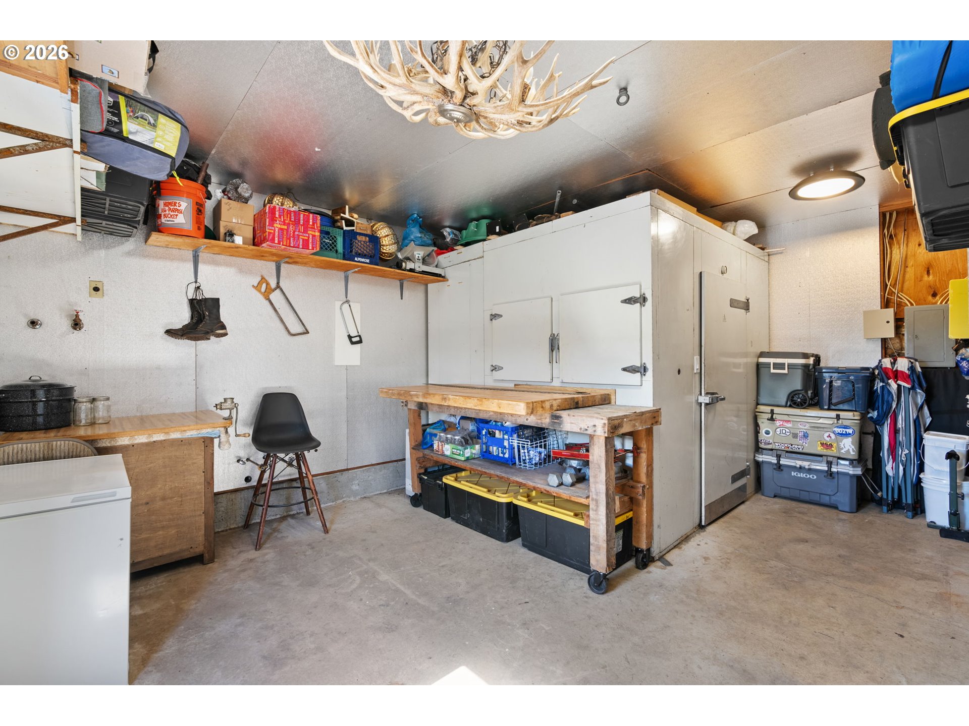 15052 Lewis River Road Ariel, WA 98603 - Photo 23 of 40 a storage room with cabinets