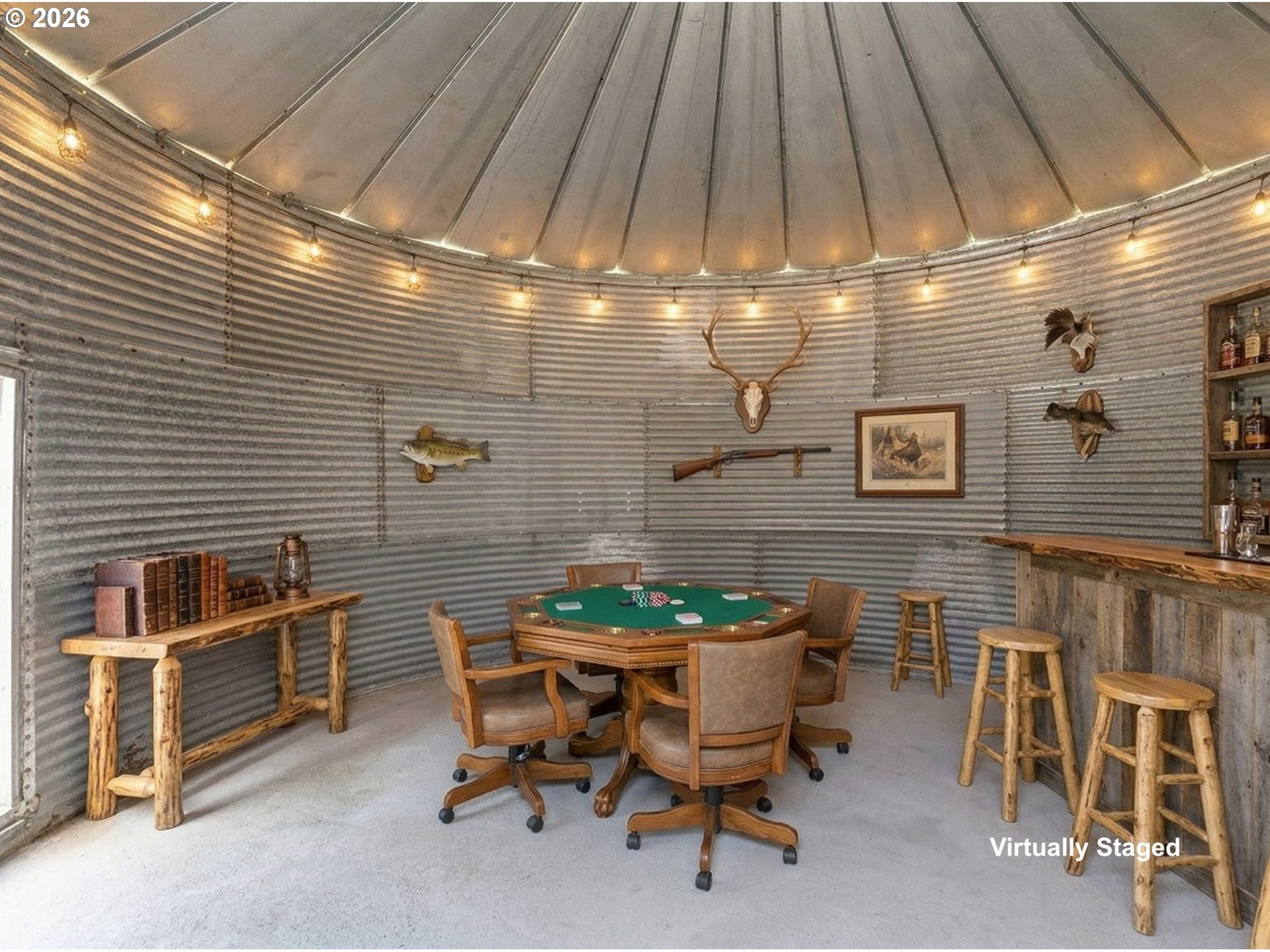 15052 Lewis River Road Ariel, WA 98603 - Photo 26 of 40 a patio with table and chairs