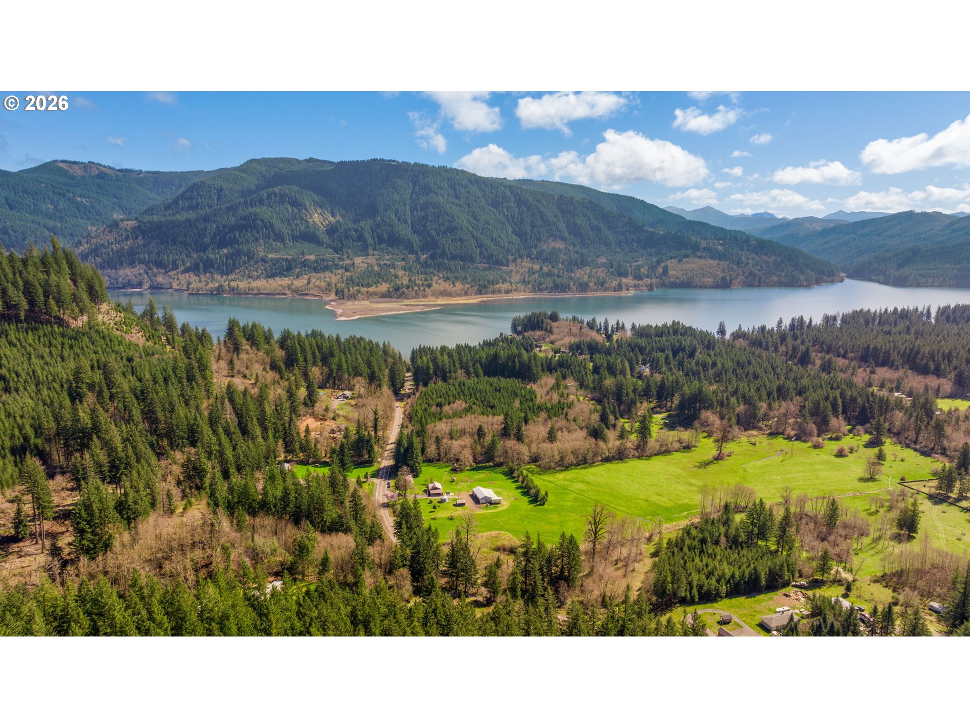 15052 Lewis River Road Ariel, WA 98603 - Photo 33 of 40 a open area with mountains in the background