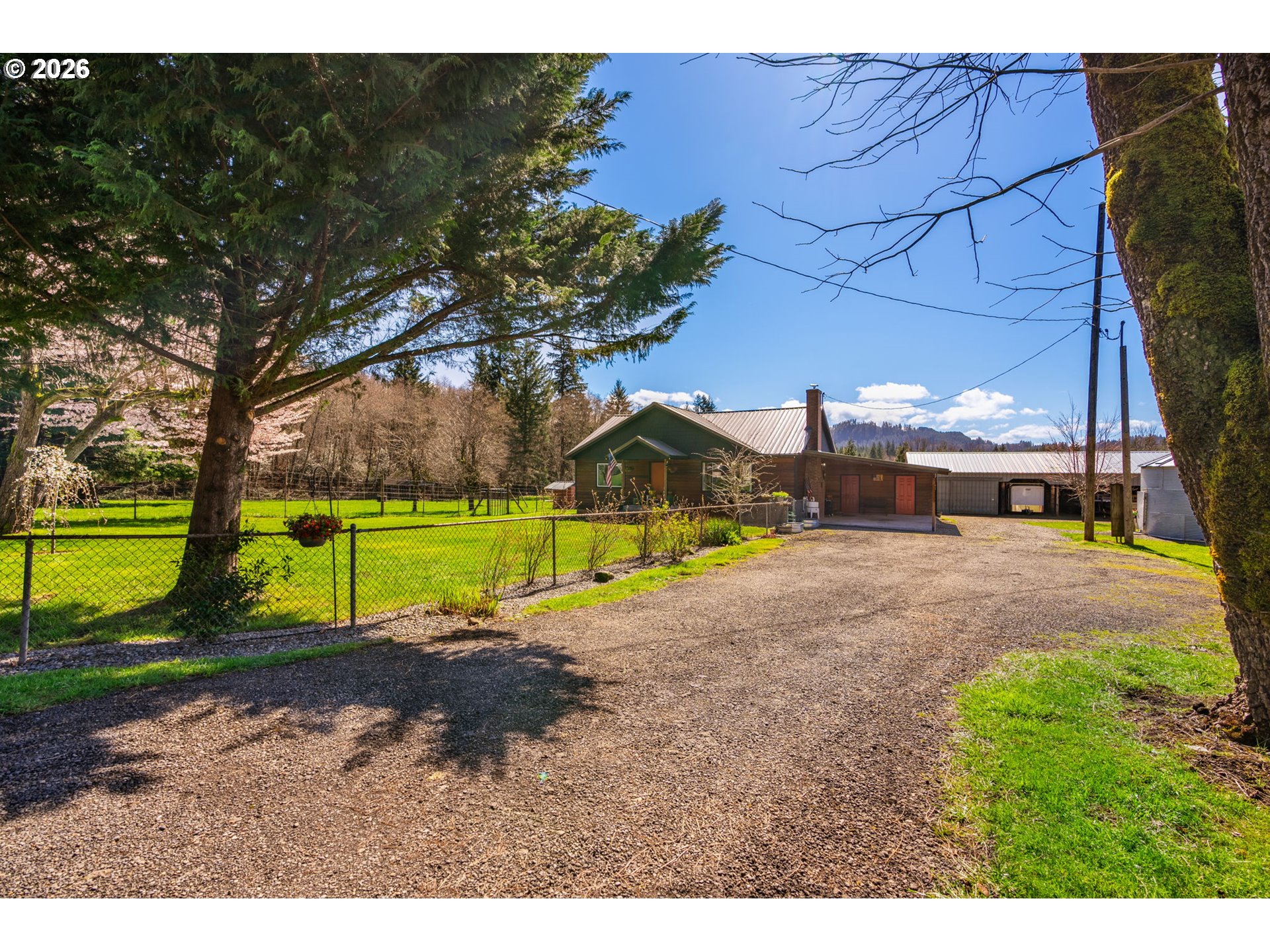 15052 Lewis River Road Ariel, WA 98603 - Photo 4 of 40 a view of a park with large trees