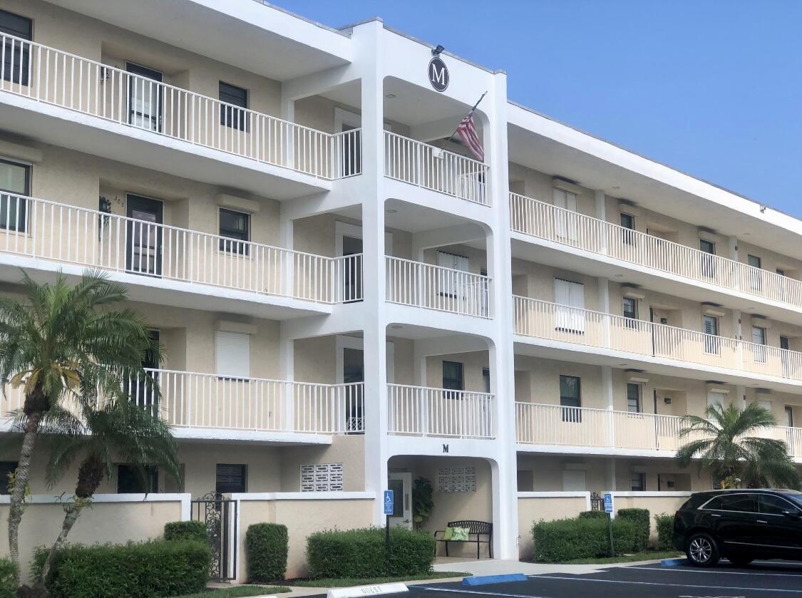 300 North Hwy A1A, Unit 405M Jupiter, FL 33477 - Photo 2 of 11 a front view of residential building
